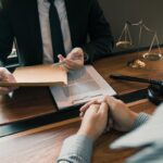 Clients come to seek advice for the law regarding privacy violations with the lawyer at the office.